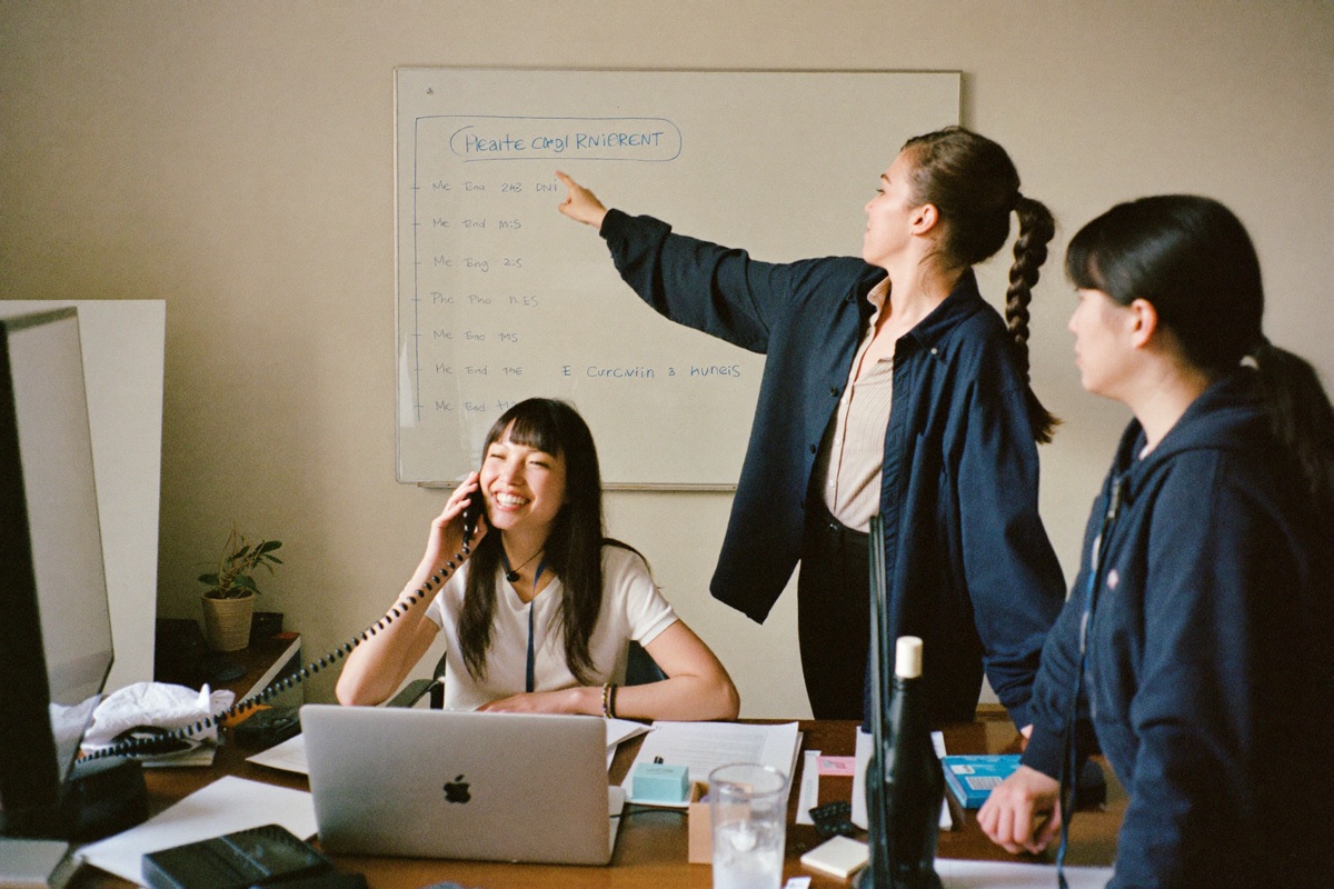A sales team working leads together